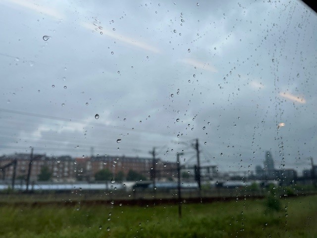 View from rainy train window. Photo.