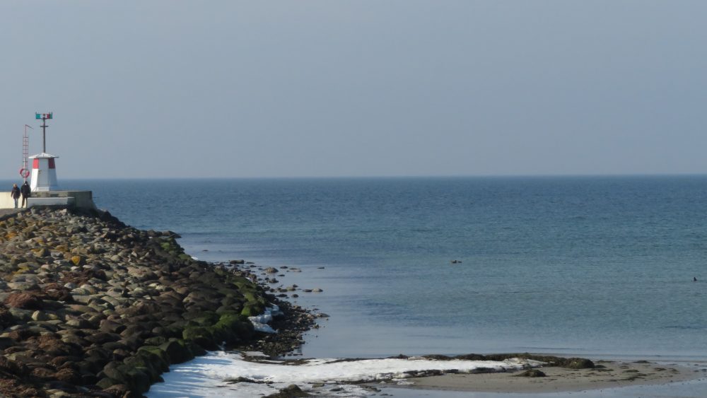 Lighthouse and sea. Photo.